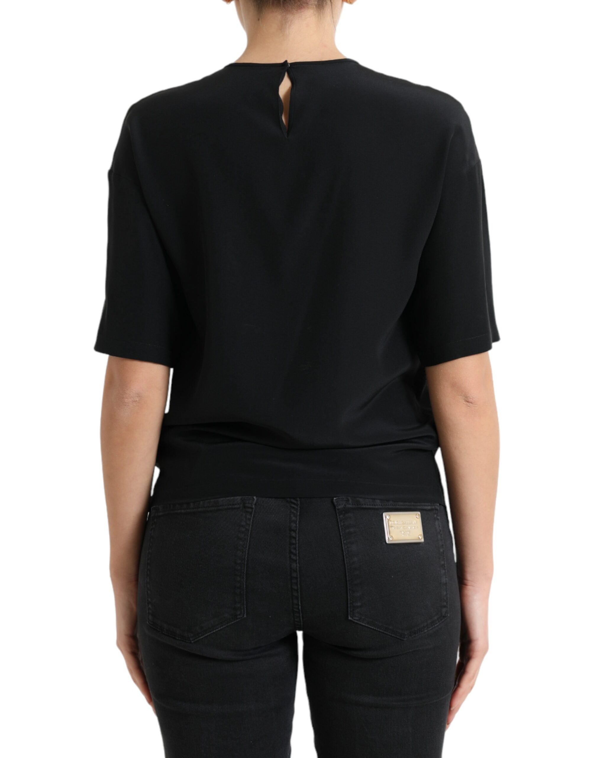 Chemise noire en soie Dolce & Gabbana à manches courtes et col rond, élégante et légère, vue de face.