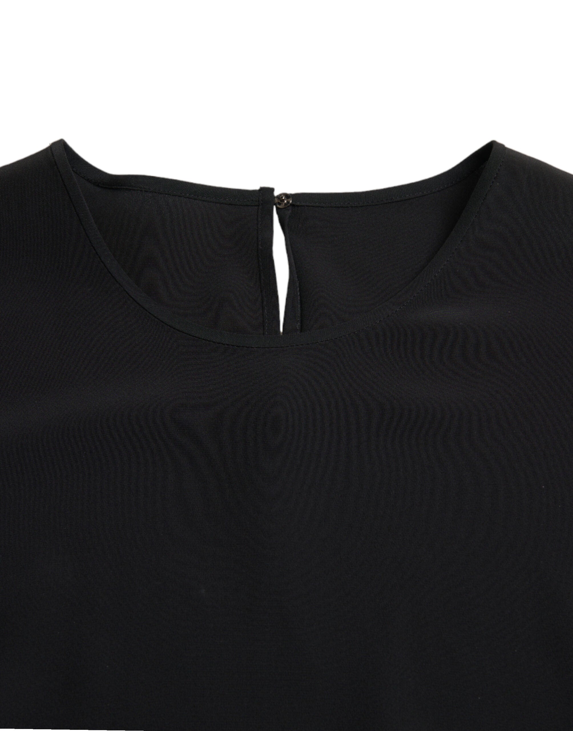 Chemise Dolce & Gabbana en soie noire avec col rond et manches courtes, élégance simple et sophistiquée pour femme.