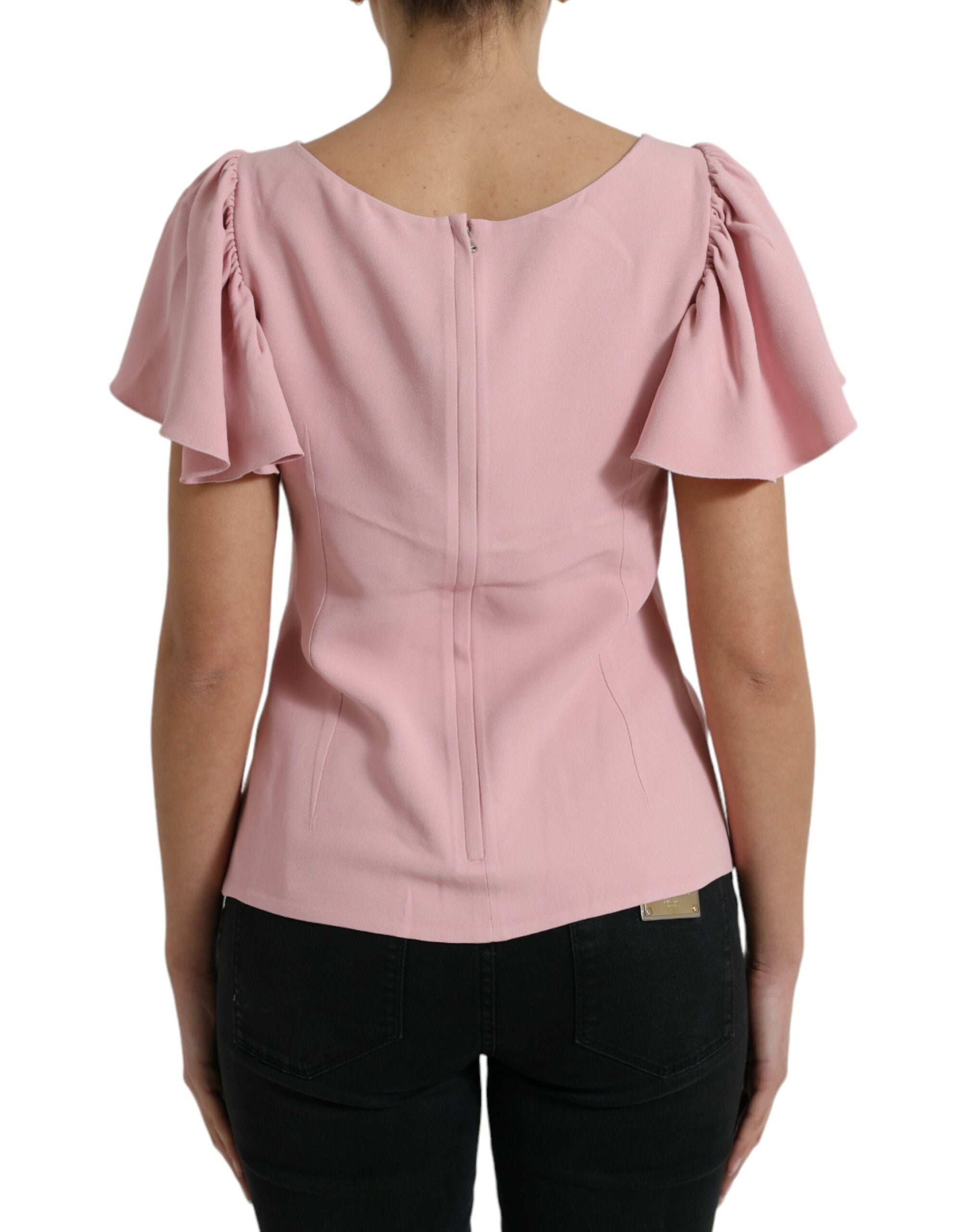 Blouse rose à manches courtes et col rond de Dolce & Gabbana, haut élégant en tissu léger.