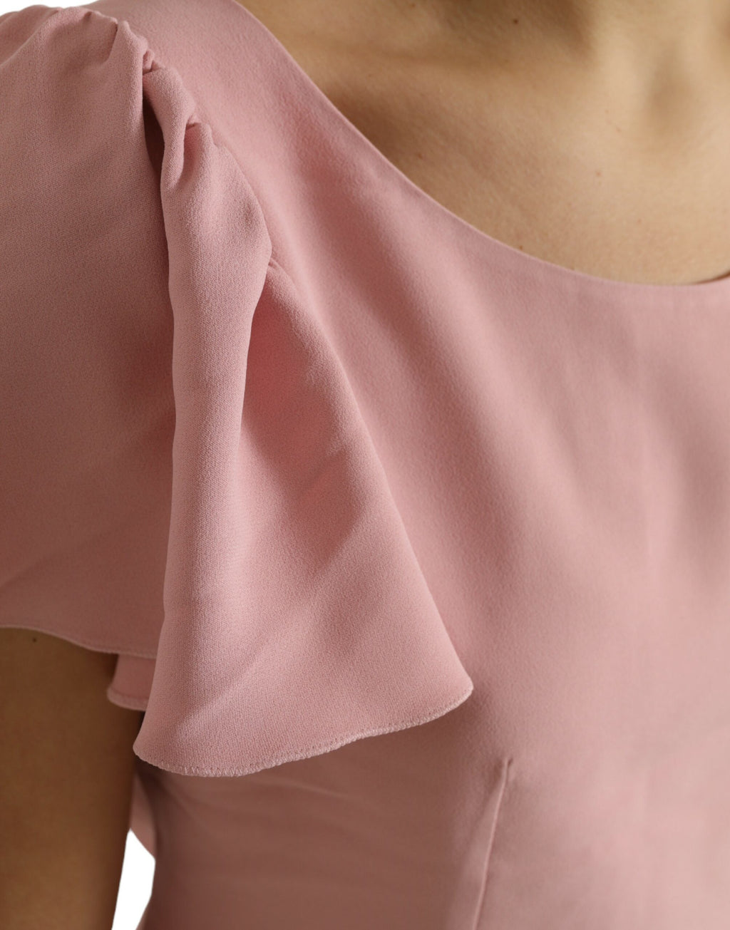 Blouse Dolce & Gabbana rose à manches courtes, col rond, style élégant et féminin, vue de face.