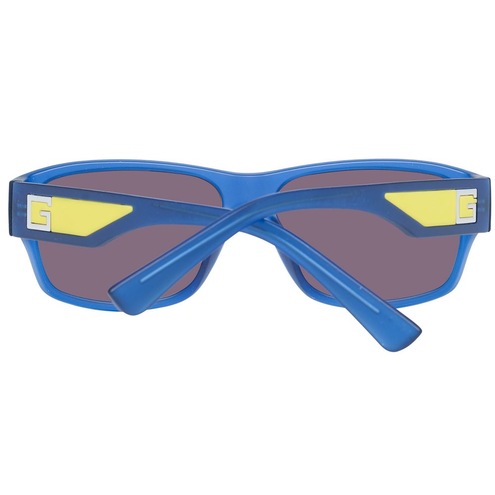 Lunettes de soleil en plastique bleues de marque Guess, vue de face avec monture élégante et lentilles foncées.