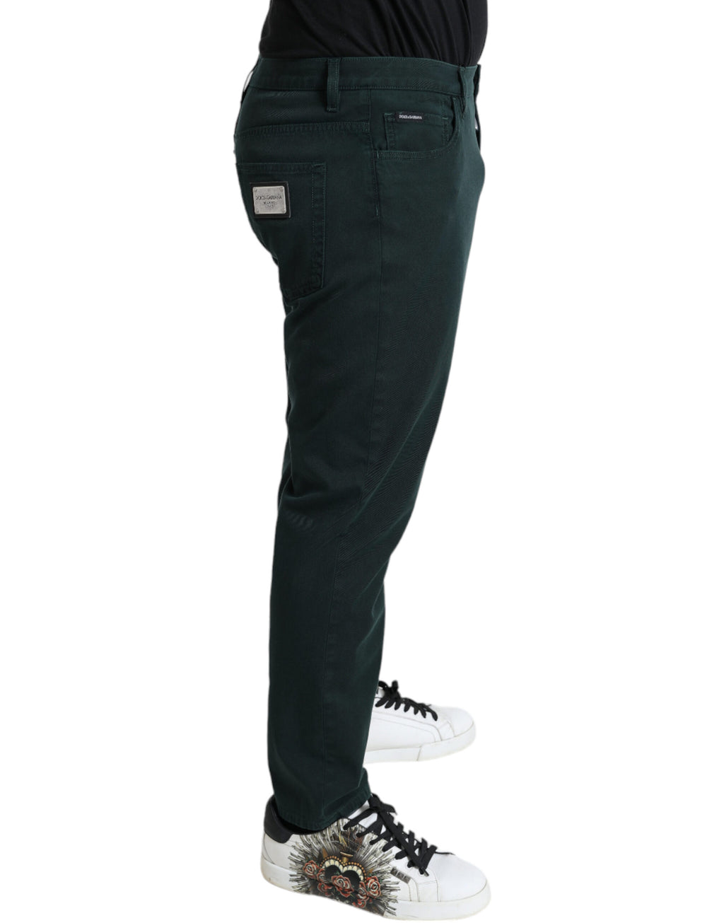 Jeans skinny en coton stretch vert de Dolce & Gabbana pour homme, coupe ajustée et tissu confortable visible sur l'image.