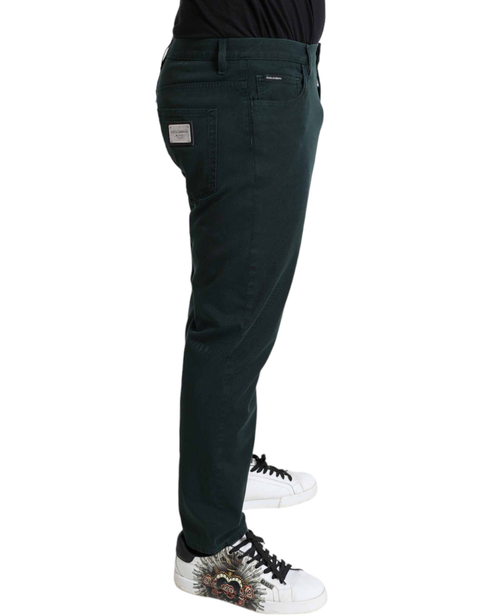 Jeans skinny en coton stretch vert de Dolce & Gabbana pour homme, coupe ajustée et tissu confortable visible sur l'image.