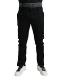 Pantalons en denim slim noir et gris de Dolce & Gabbana, coton, coupe ajustée et style moderne visible sur l'image.