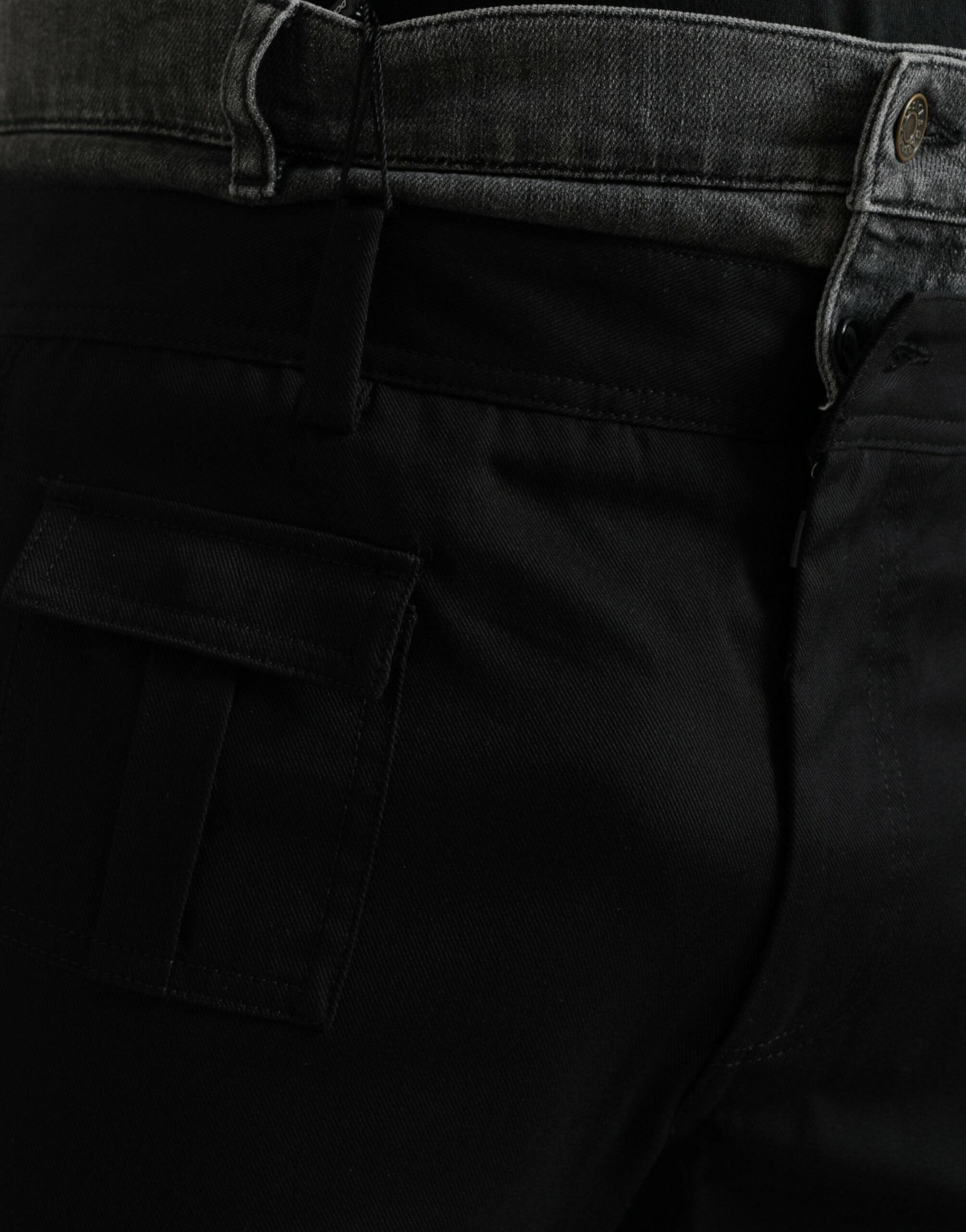 Pantalons en jean noir et gris slim en coton de Dolce & Gabbana, coupe ajustée et détail denim visible.