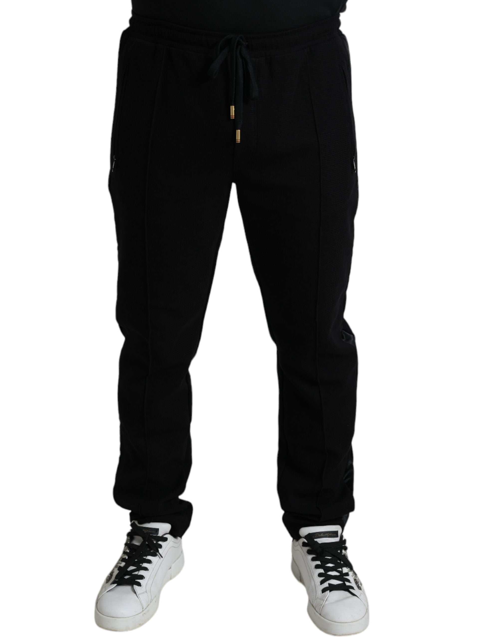 Pantalons jogger skinny en coton noir de Dolce & Gabbana, style décontracté avec ceinture élastique et poches latérales.