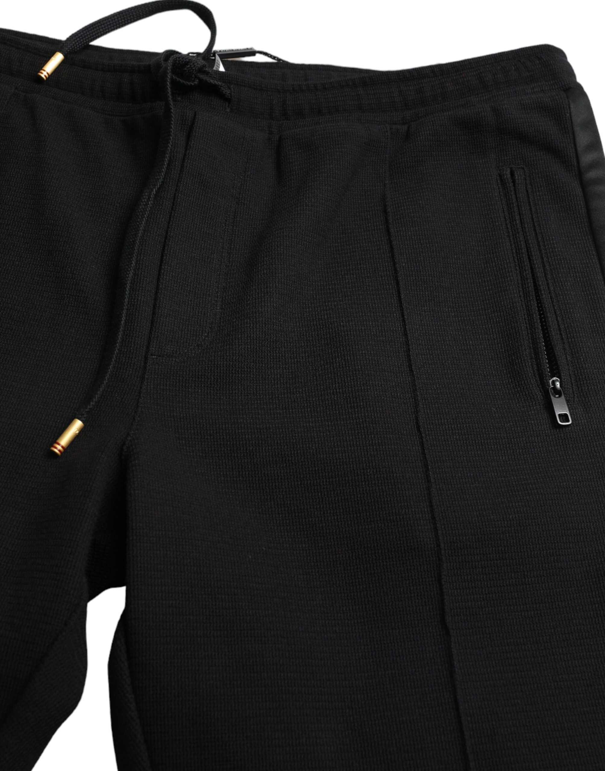 Pantalon jogging skinny en coton noir de Dolce & Gabbana, style confortable et tendance pour homme.