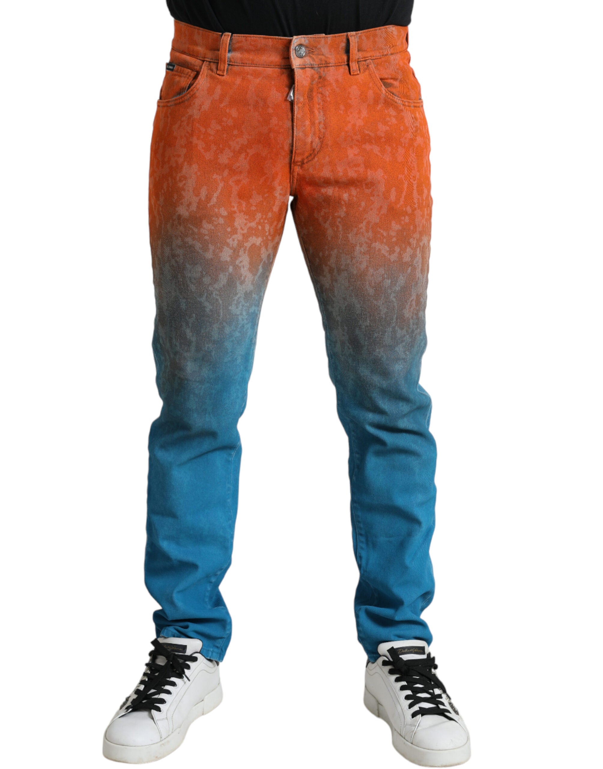 Jeans en denim slim fit Dolce & Gabbana, coton multicolore avec dégradé ombré, visibles détails de couture et style moderne.