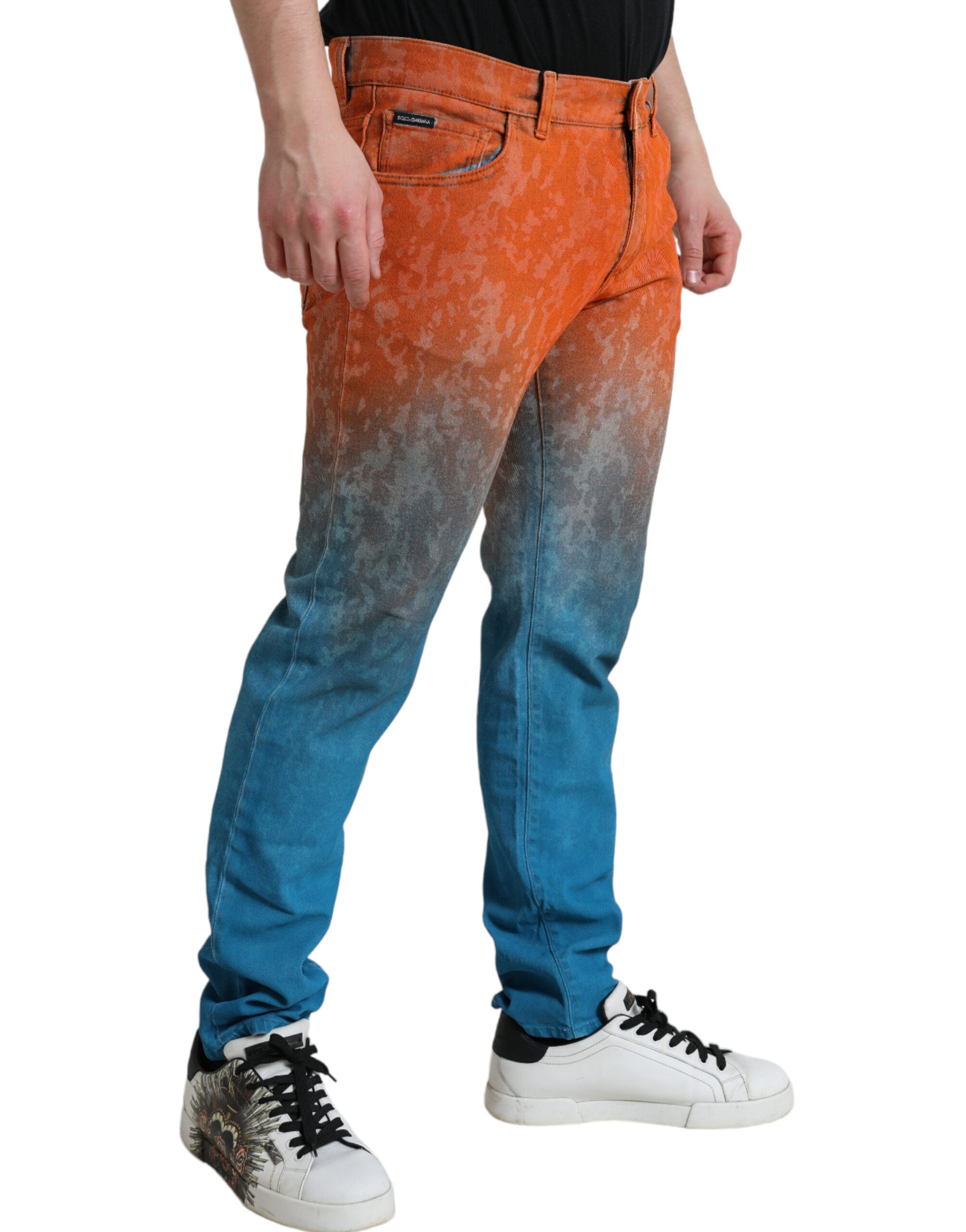 Jeans slim en coton dégradé multicolore de Dolce & Gabbana, denim ajusté avec fini ombré.