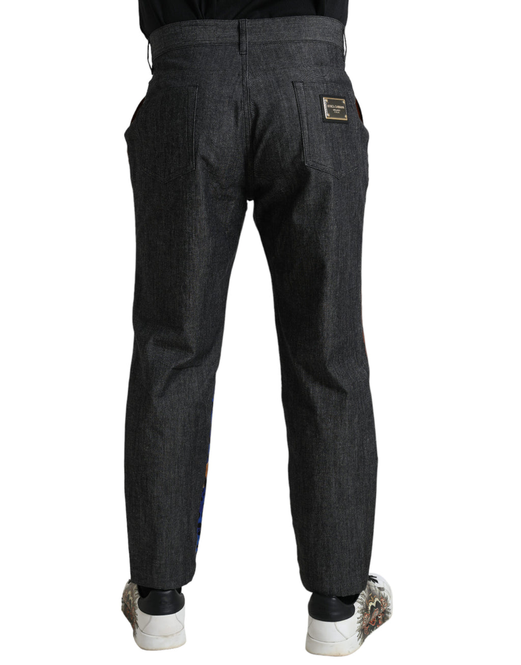 Jeans en denim ample multicolore à tigre de Dolce & Gabbana, coton, avec motif animalier, visibles en image.