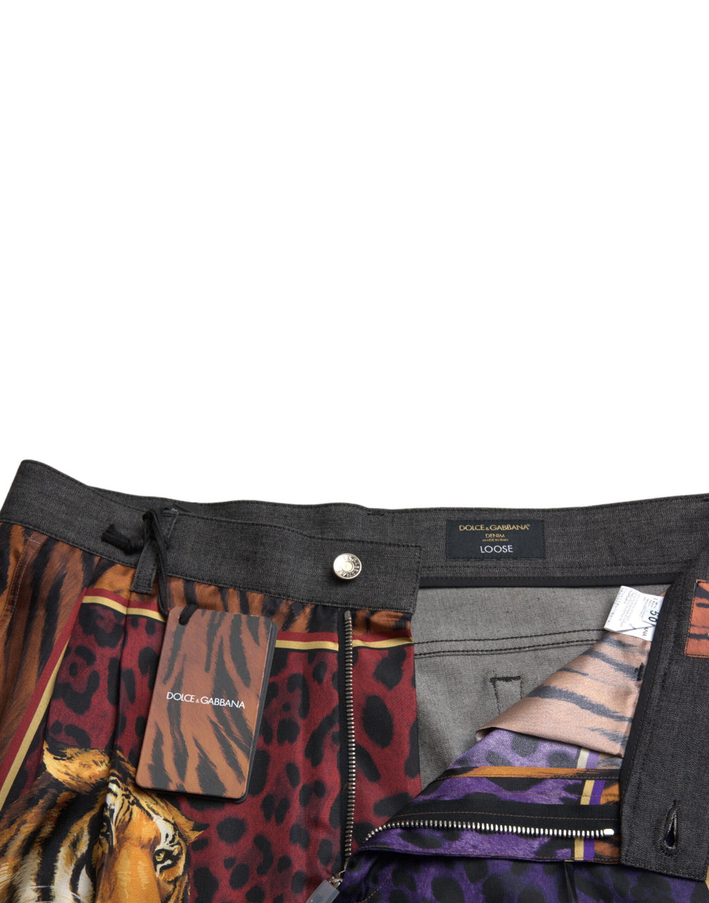 Jeans en denim ample de Dolce & Gabbana avec motif tigre multicolore en coton, style décontracté et tendance.