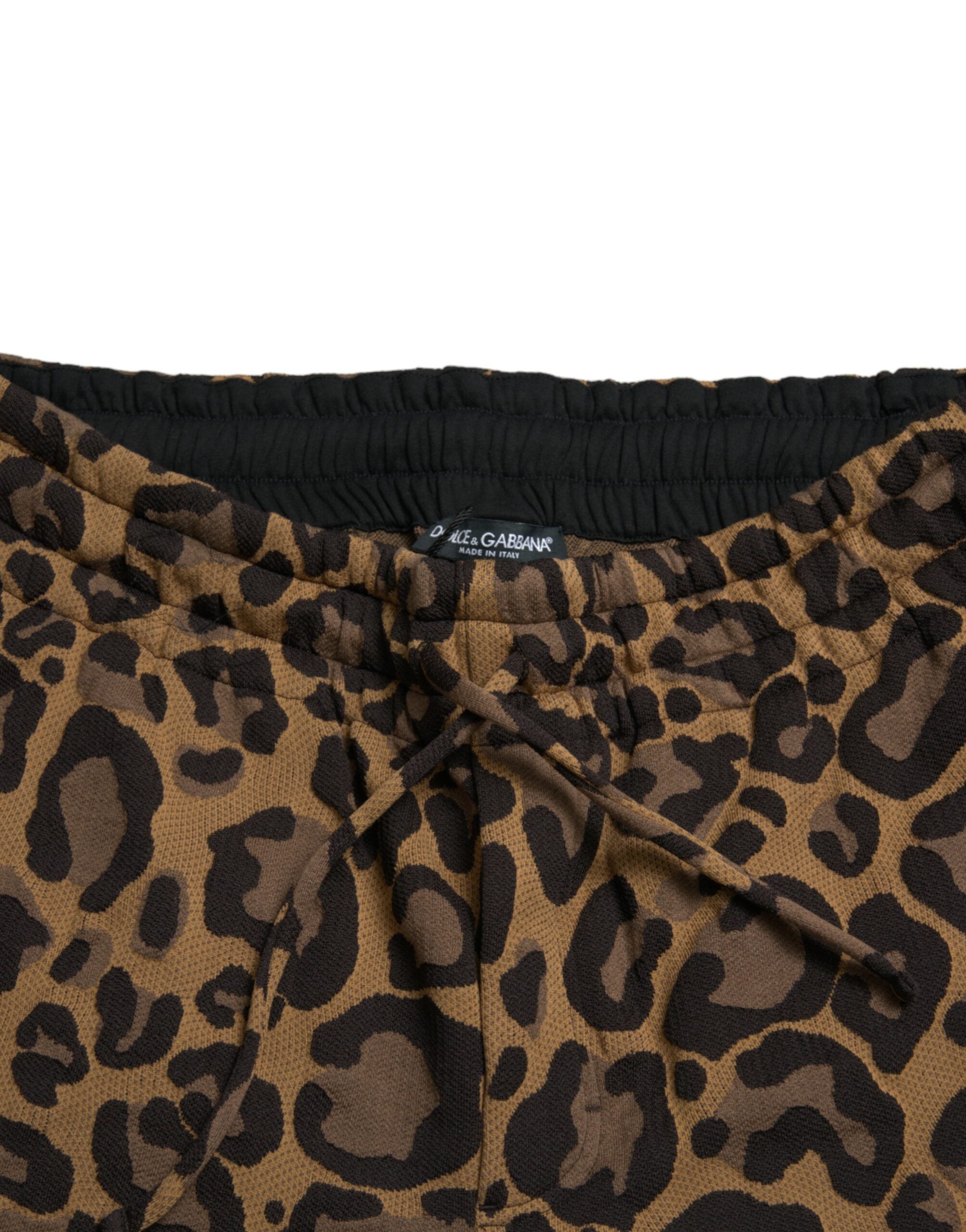 Pantalons jogger en jacquard léopard marron de Dolce & Gabbana, style confortable et tendance, visibles avec détails du motif léopard.