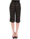 Shorts en tissu noir Dolce & Gabbana, pantalon court élégant pour homme, avec détails modernes et couture de luxe.