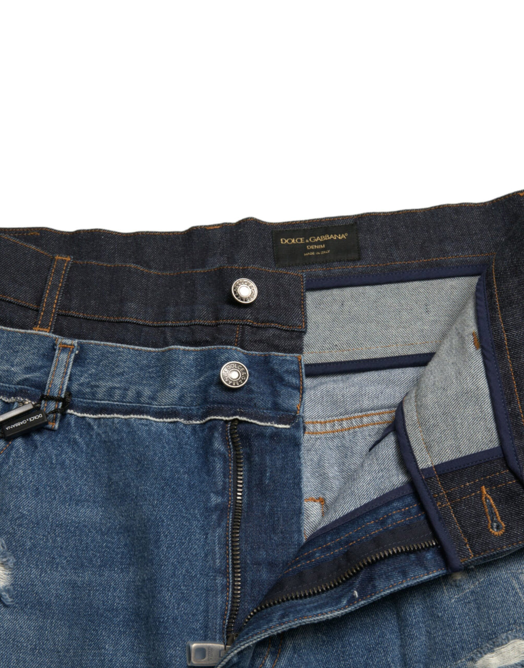 Jeans en denim pour homme Dolce & Gabbana, coton bleu déchiré et usé, style décontracté et tendance.