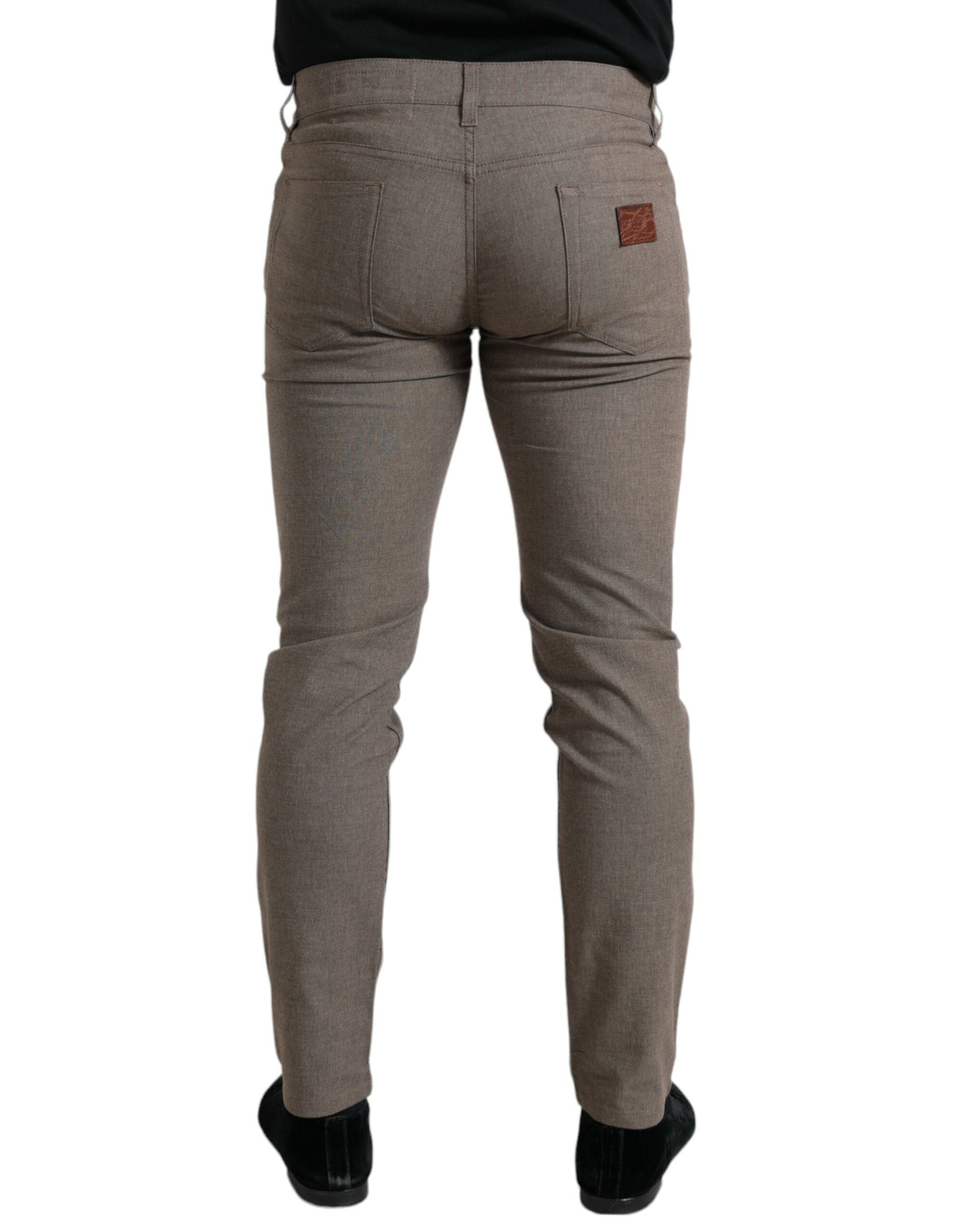 Pantalon homme skinny en coton stretch marron Dolce & Gabbana, coupe ajustée et détails modernes.