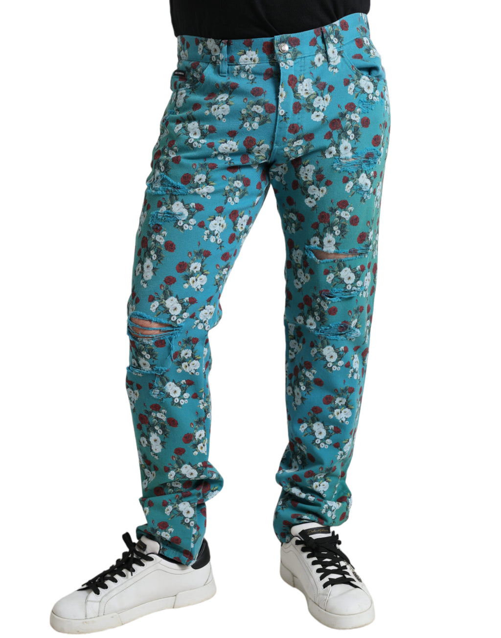 Pantalon skinny en coton denim à imprimé floral bleu de Dolce & Gabbana, style élégant et tendance.