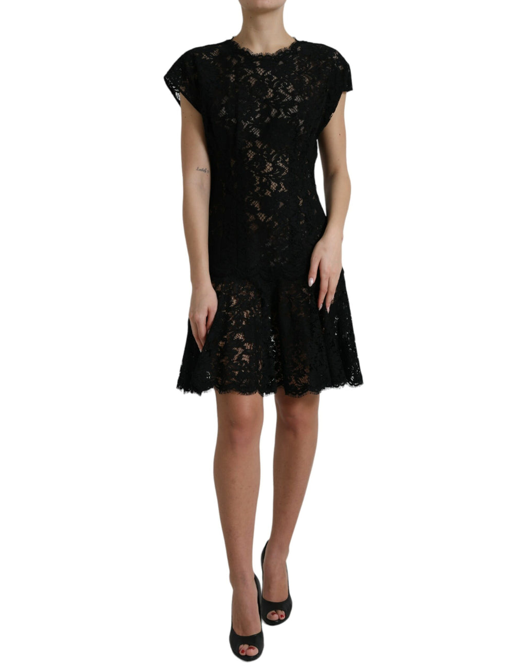 Robe courte noire en dentelle florale en coton de Dolce & Gabbana, coupe évasée et élégante, pour un style sophistiqué.