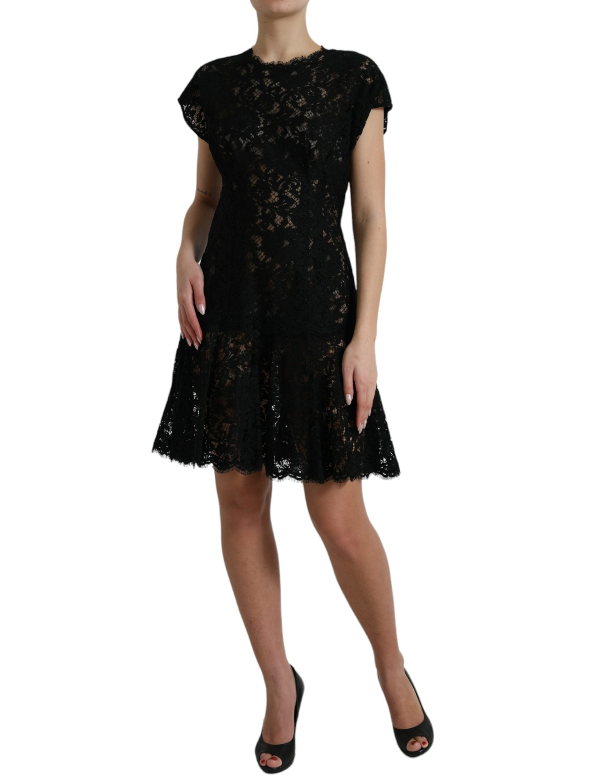 Robe courte en coton noir à fleurs en dentelle Dolce & Gabbana, coupe évasée et élégante, avec détails floraux raffinés.