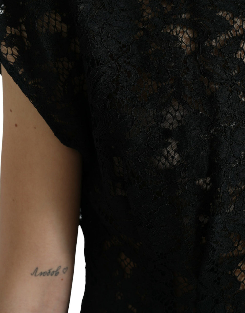 Robe mini noire en coton avec dentelle florale Dolce & Gabbana, coupe A-line élégante et féminine.