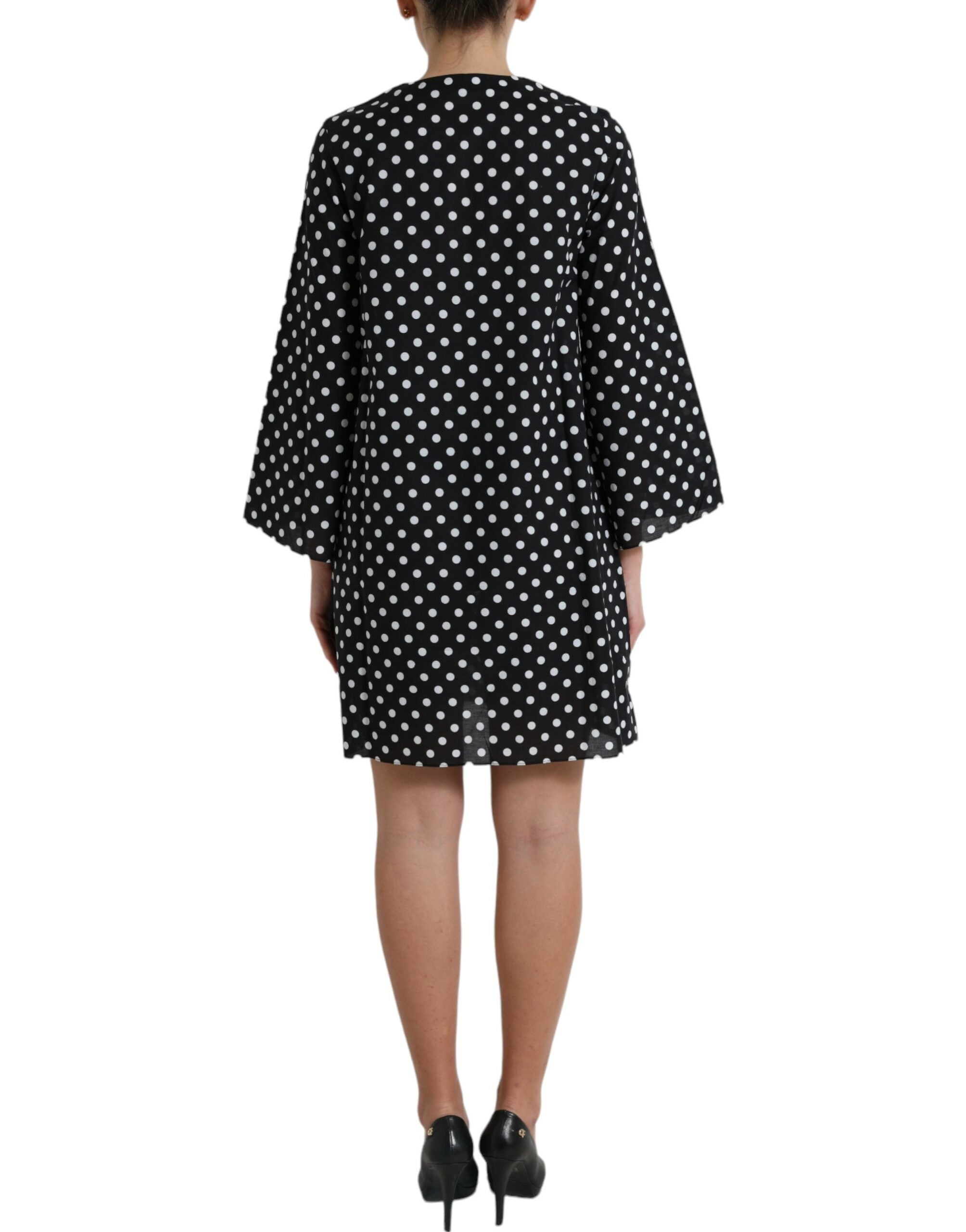 Robe courte en nylon à pois noirs et blancs de Dolce & Gabbana, style décontracté avec coupe fluide et motif à pois.