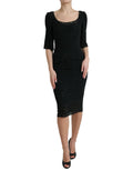 Robe midi noire Dolce & Gabbana en viscose avec dentelle florale, coupe bodycon, élégante et féminine.