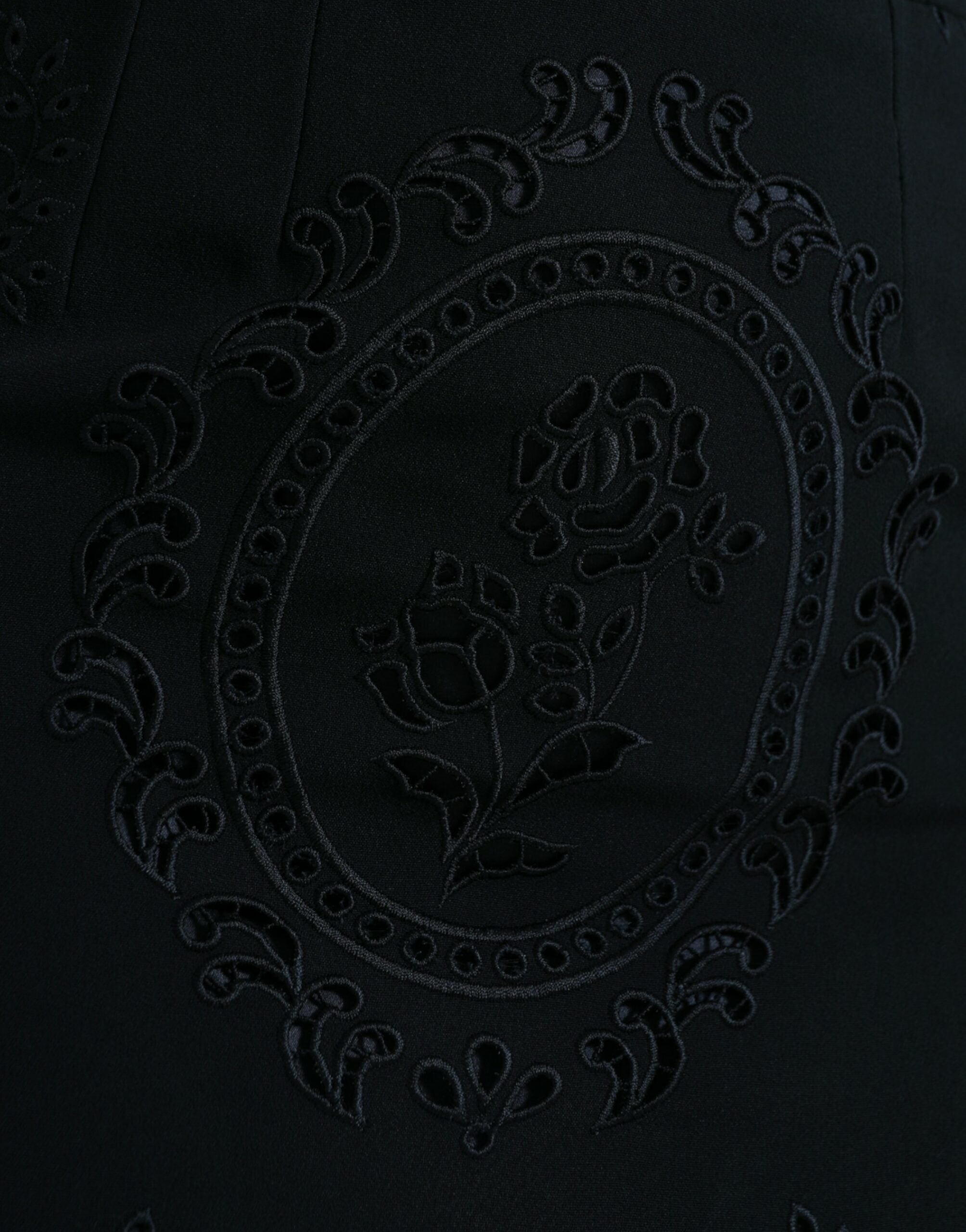 Robe midi noire en dentelle florale en viscose de Dolce & Gabbana, robe moulante élégante avec détails floraux.