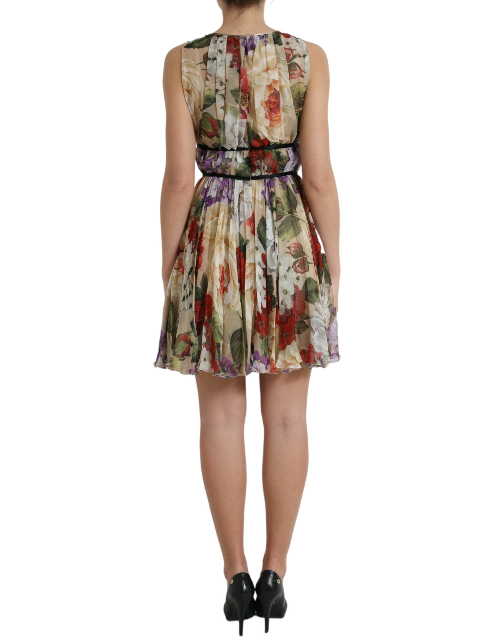 Robe mini sans manches Dolce & Gabbana beige à fleurs, coupe évasée A-line, détails floraux élégants.