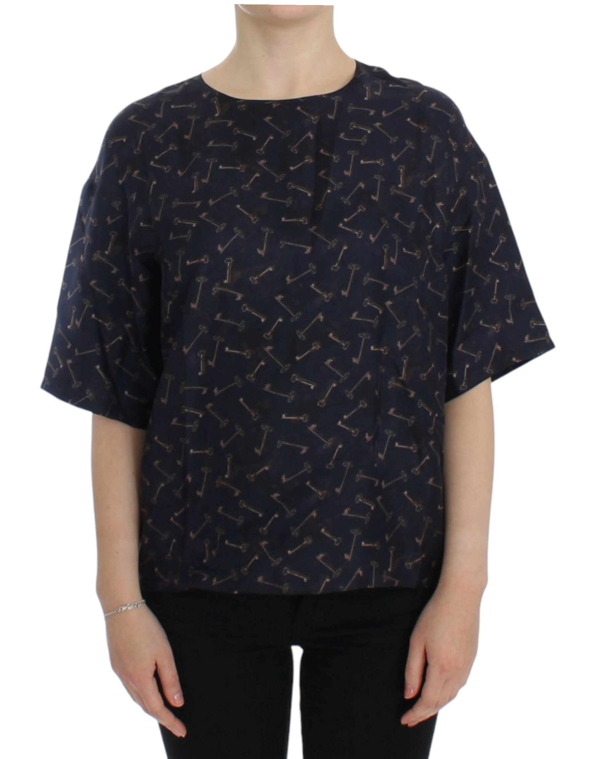 Blouse en soie Dolce & Gabbana à motif clé bleu et or, vêtement élégant avec détails sophistiqués visible sur l'image.