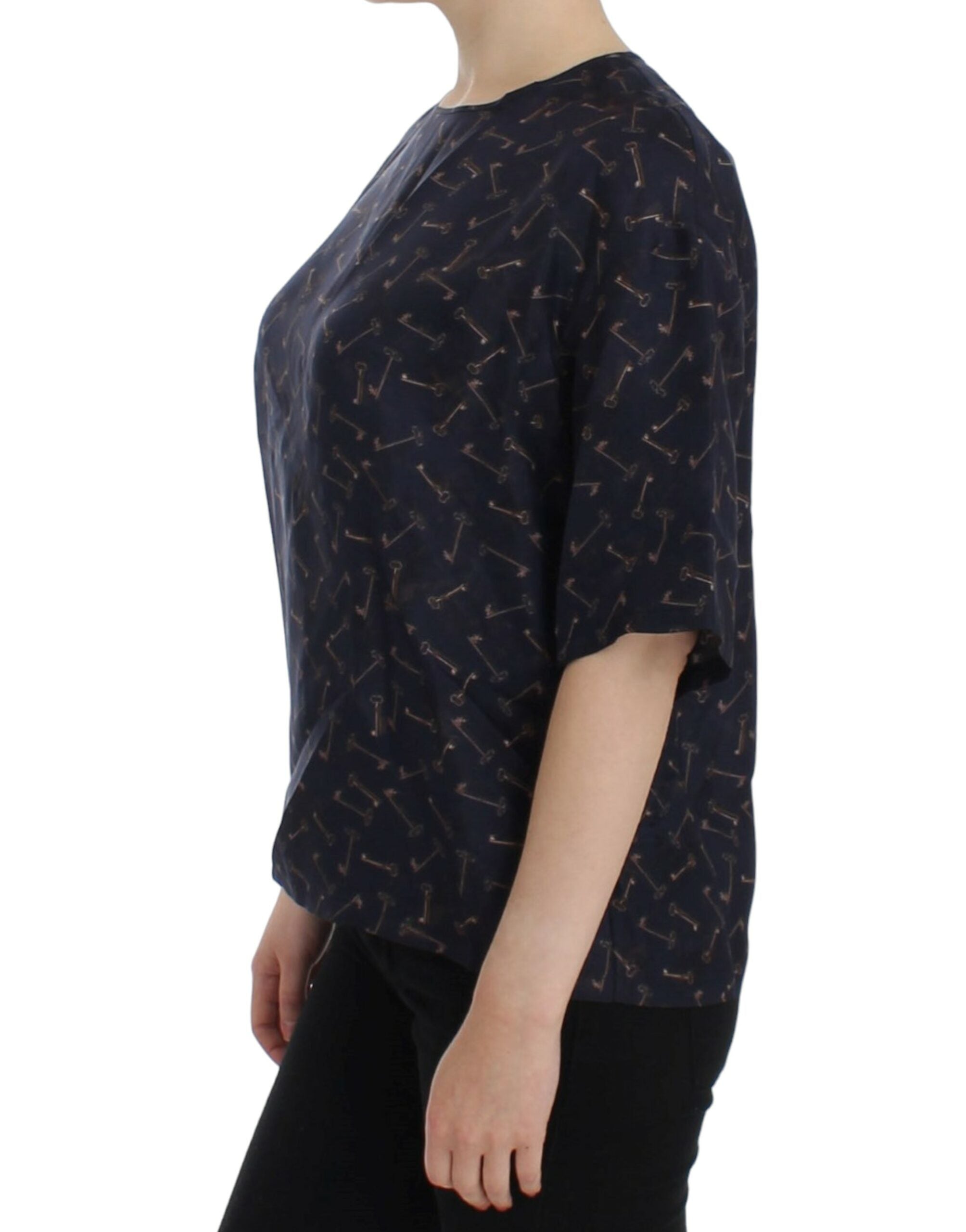 Chemisier en soie bleu et or avec motif clé de Dolce & Gabbana, élégant et sophistiqué.