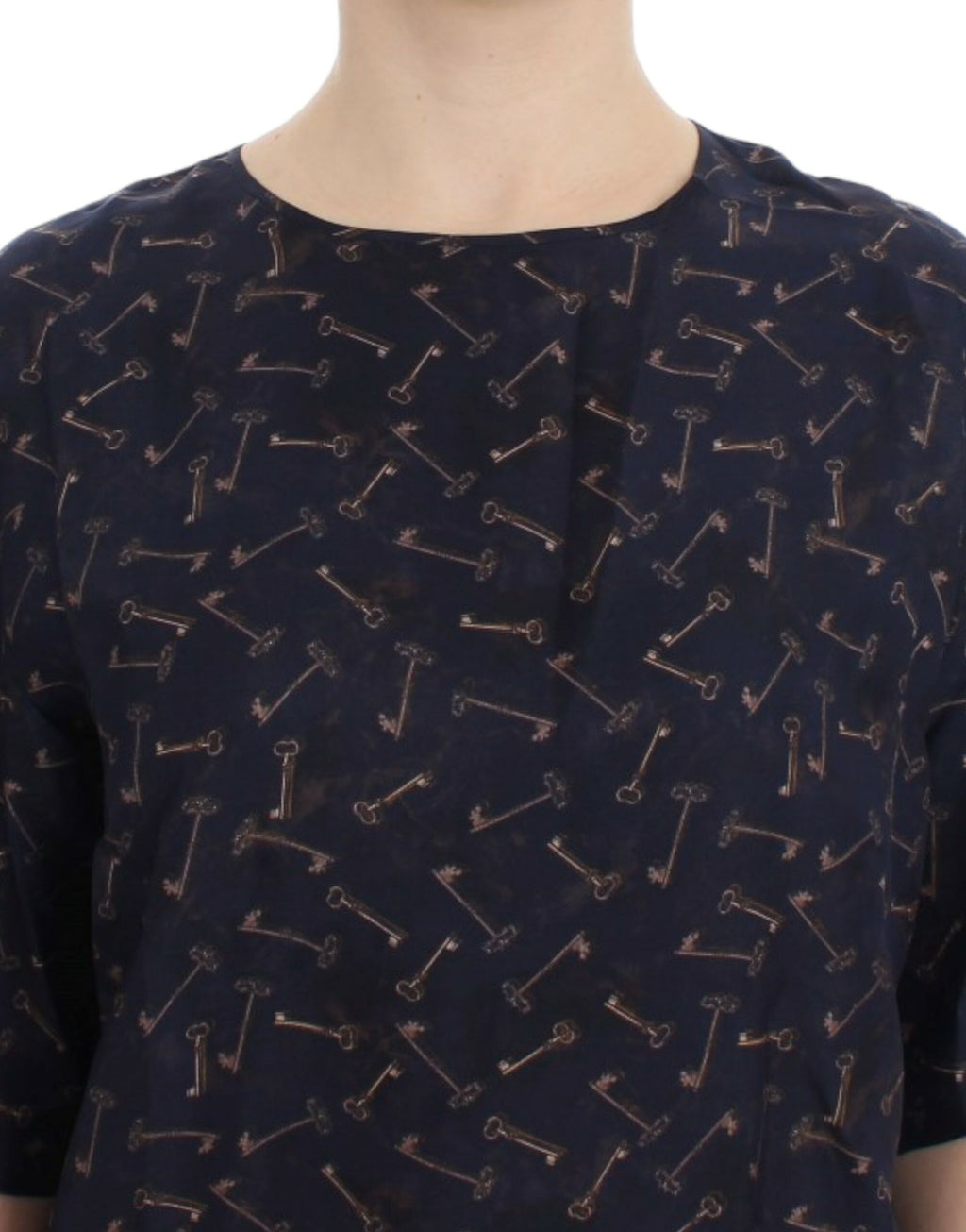 Blouse en soie bleue et or à motif clé Dolce & Gabbana, détail élégant et tissu fluide visible sur l'image.