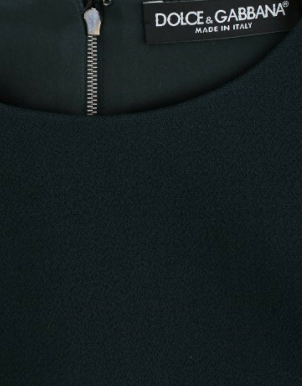 Blouse en laine verte Dolce & Gabbana à manches 3/4, style élégant et sophistiqué, portée décontractée ou formelle.