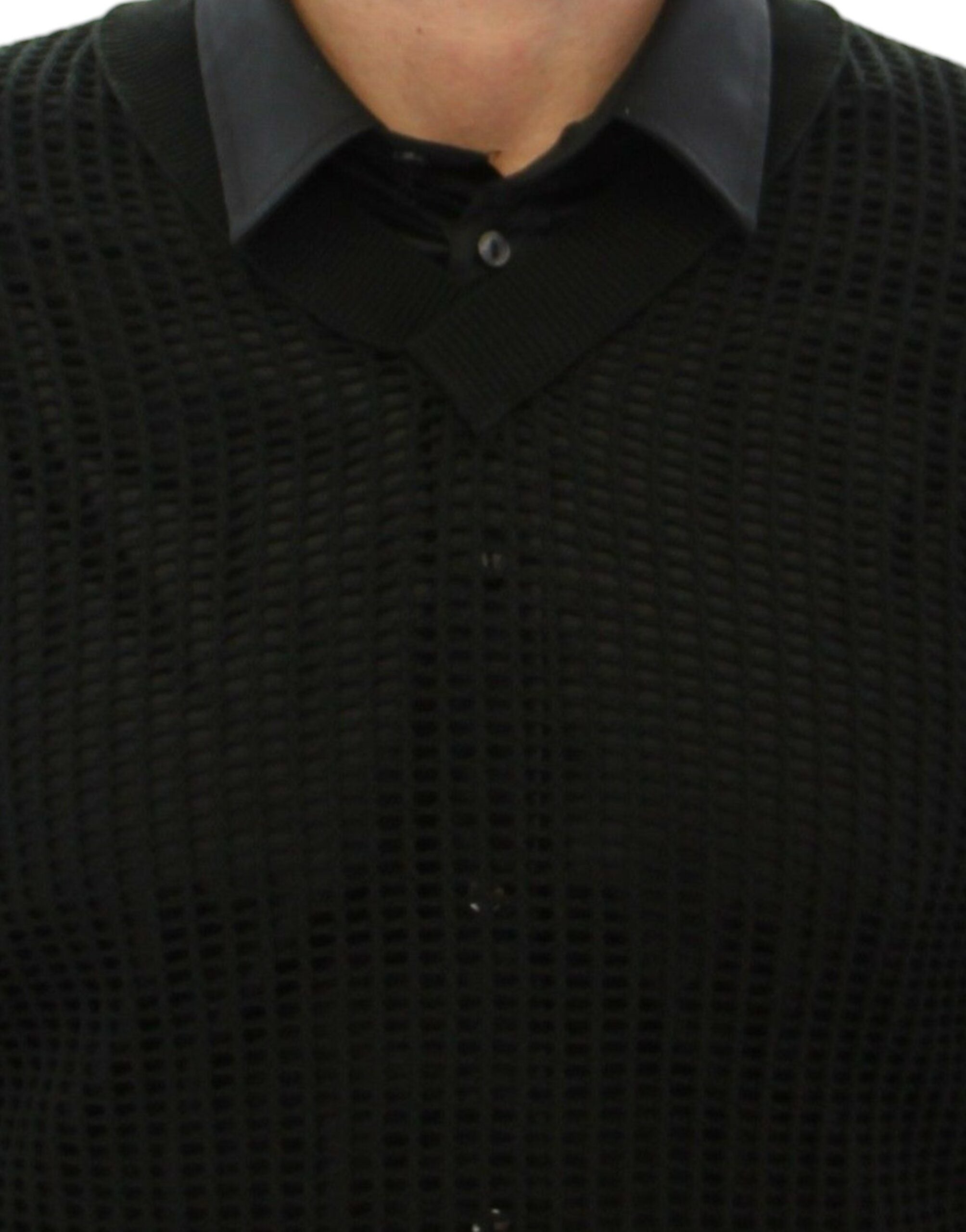 Pull Dolcé & Gabbana vert foncé en maille filet, pull-over sur le runway avec motif en filet.