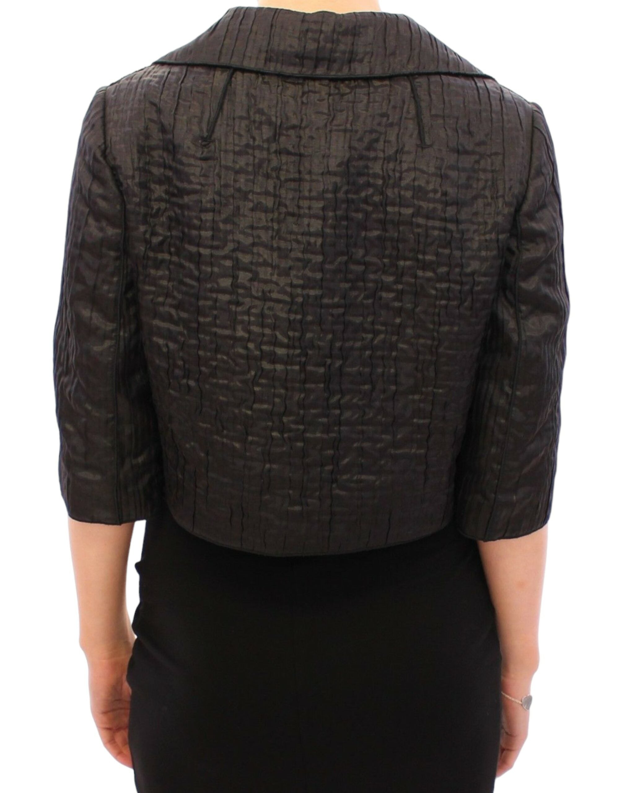 Veste courte noire Dolce & Gabbana boléro en tissu léger avec manches courtes et coupe élégante.