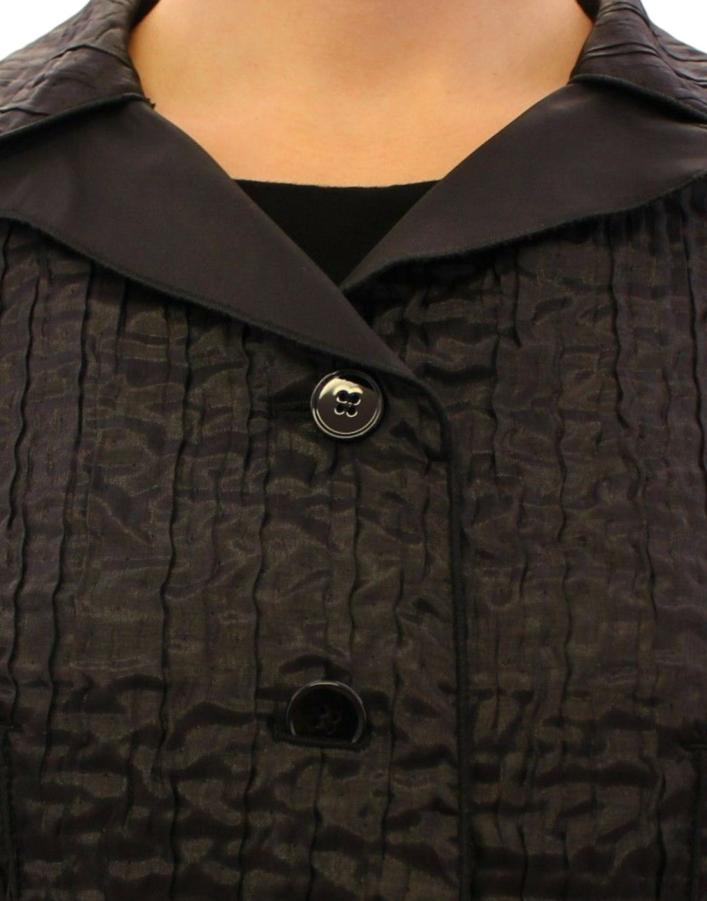 Veste courte noire Dolce & Gabbana en boléro ou shrug, en tissu élégant avec manches courtes et design sophistiqué.