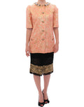 Veste en soie rose brocart avec cristaux de Dolce & Gabbana, élégante et ornée de détails brillants, vue de face.