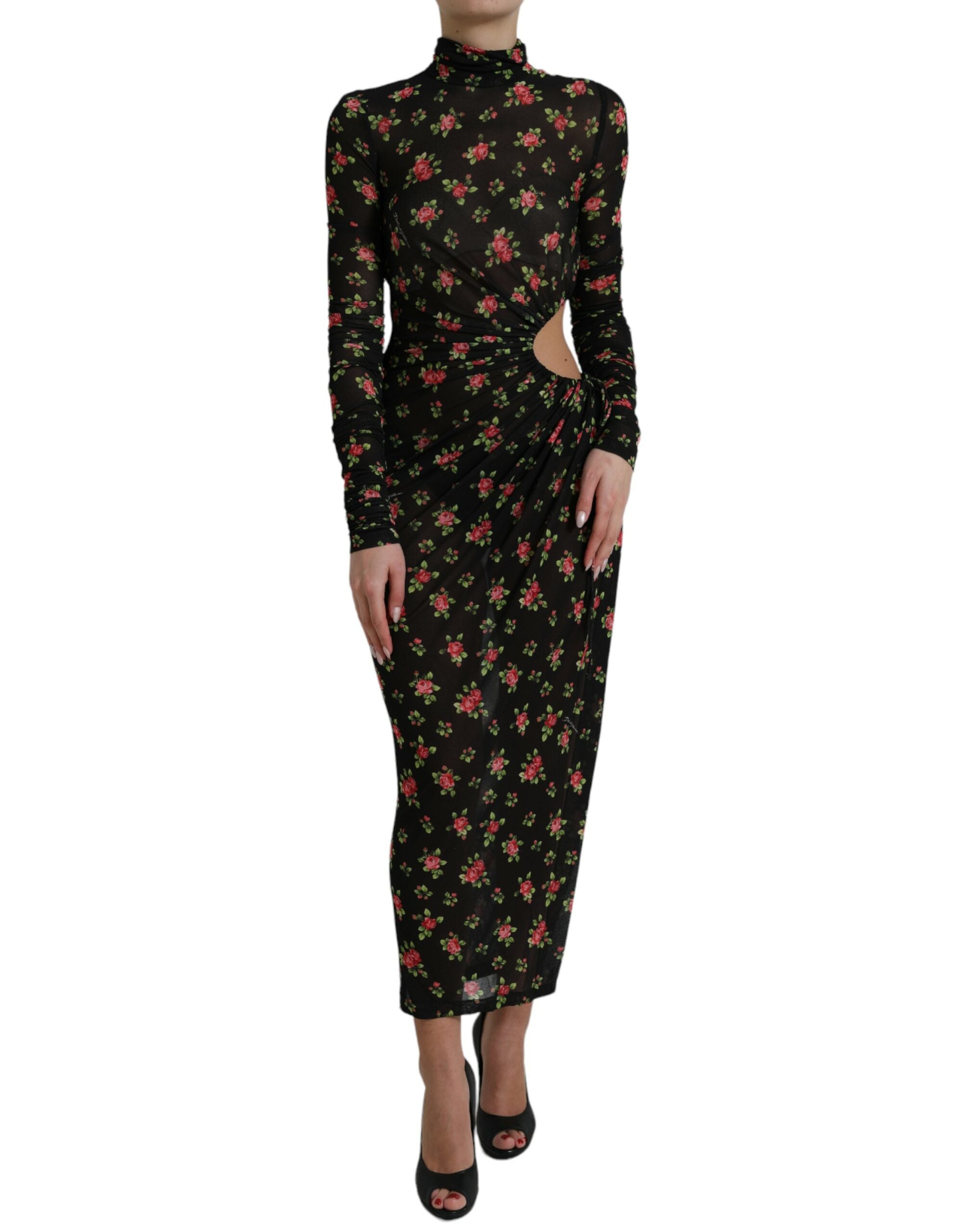 Robe longue noire à fleurs et découpes Dolce & Gabbana, robe de soirée élégante avec coupe ajustée et détails floraux.
