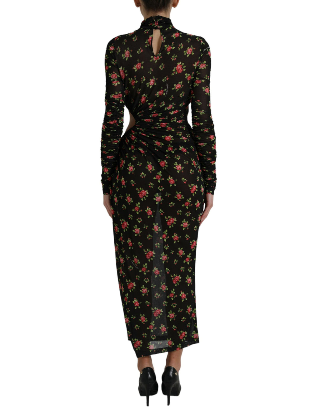 Robe longue noire à fleurs Dolce & Gabbana, coupe moulante avec découpes élégantes, robe de soirée sophistiquée.