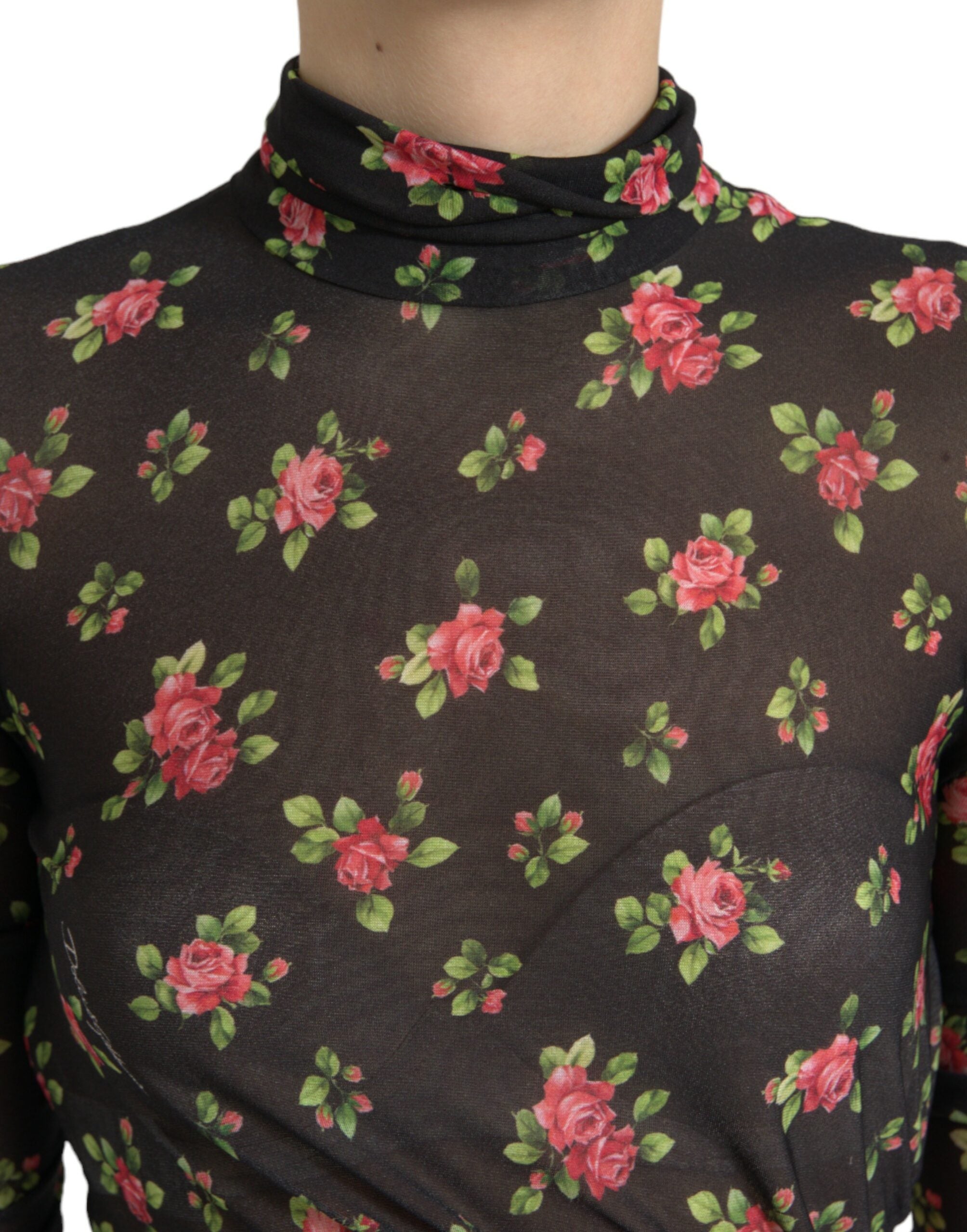 Robe longue noire Dolce & Gabbana à fleurs avec découpes, robe de soirée élégante en tissu fluide.