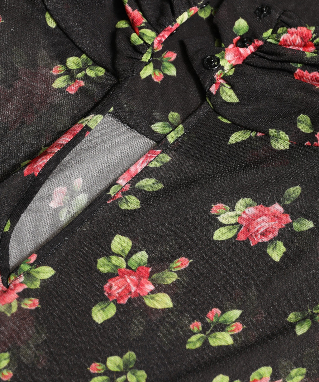 Robe longue noire Dolce & Gabbana à fleurs avec découpes, robe fourreau élégante et sophistiquée pour femmes.