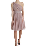 Robe rose à épaules asymétriques Dolce & Gabbana en tulle plissé et lamé, élégante et sophistiquée.