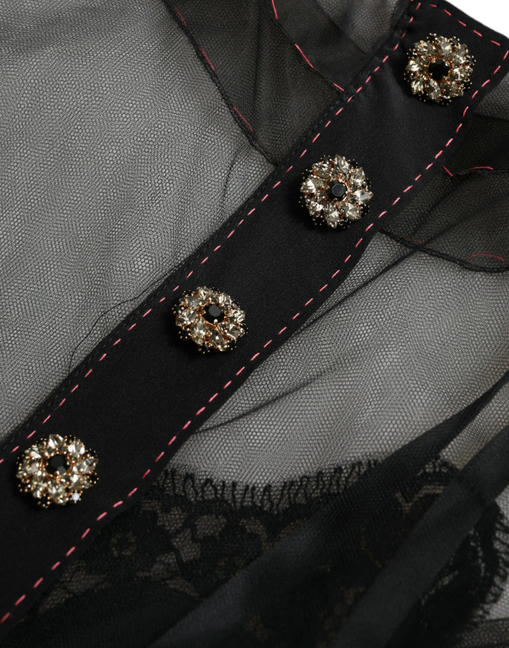Robe longue en tulle noir Dolce & Gabbana avec broderie florale, design élégant et détails délicats.