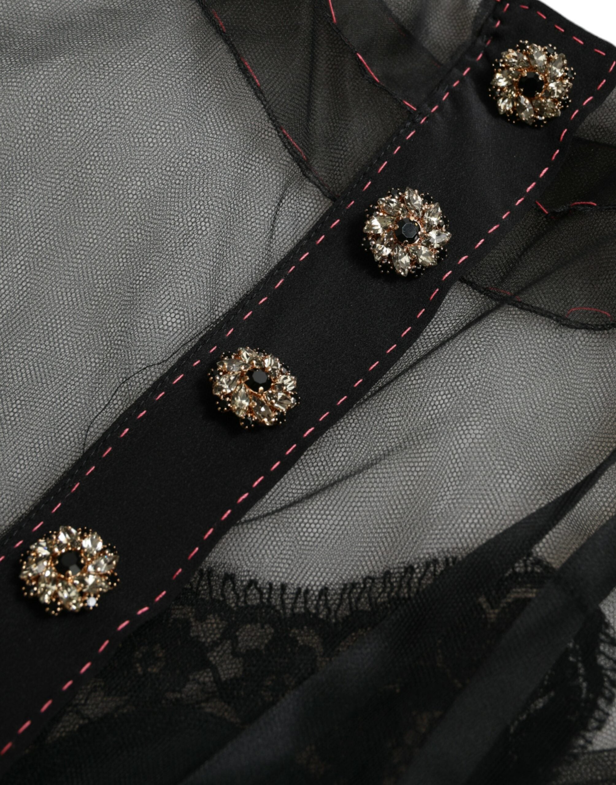 Robe longue en tulle noir Dolce & Gabbana avec broderie florale, design élégant et détails délicats.