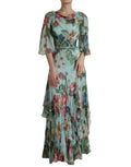 Robes longues maxi à fleurs bleues en plusieurs couches de Dolce & Gabbana, détail floral et élégance sophistiquée.