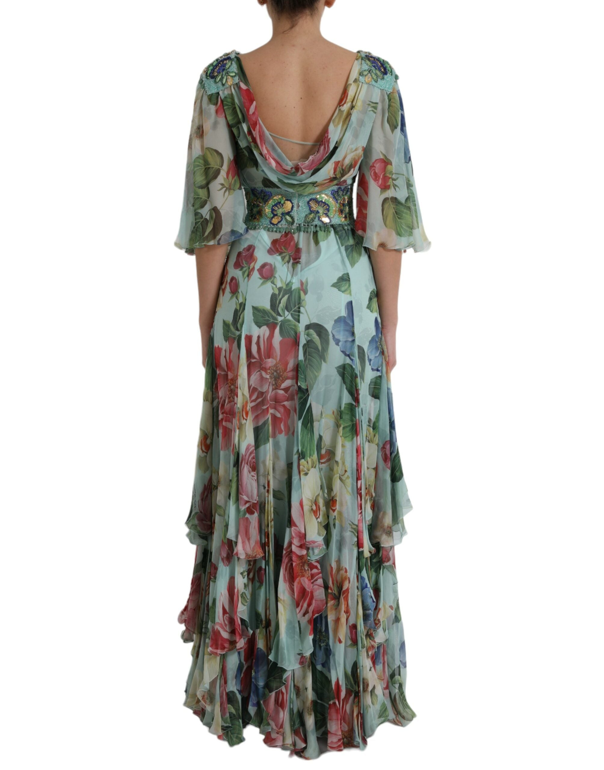 Robe longue à fleurs bleues Dolce & Gabbana avec jupe en couches et coupe élégante, idéale pour une tenue sophistiquée.