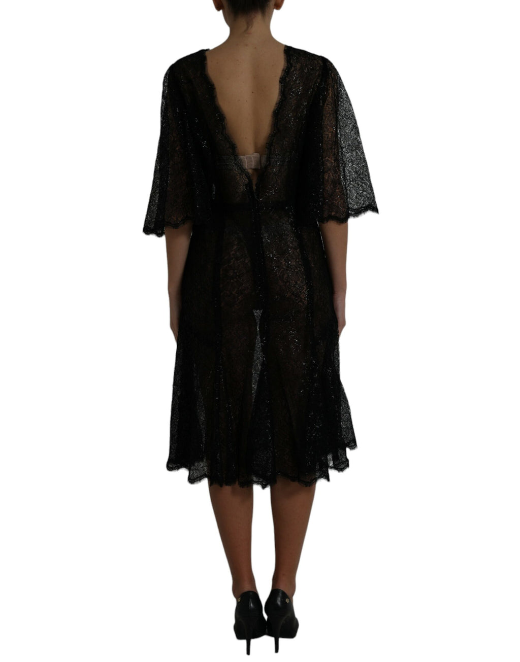 Robe mi-longue en dentelle florale noire de Dolce & Gabbana, coupe A-line, transparente et élégante.