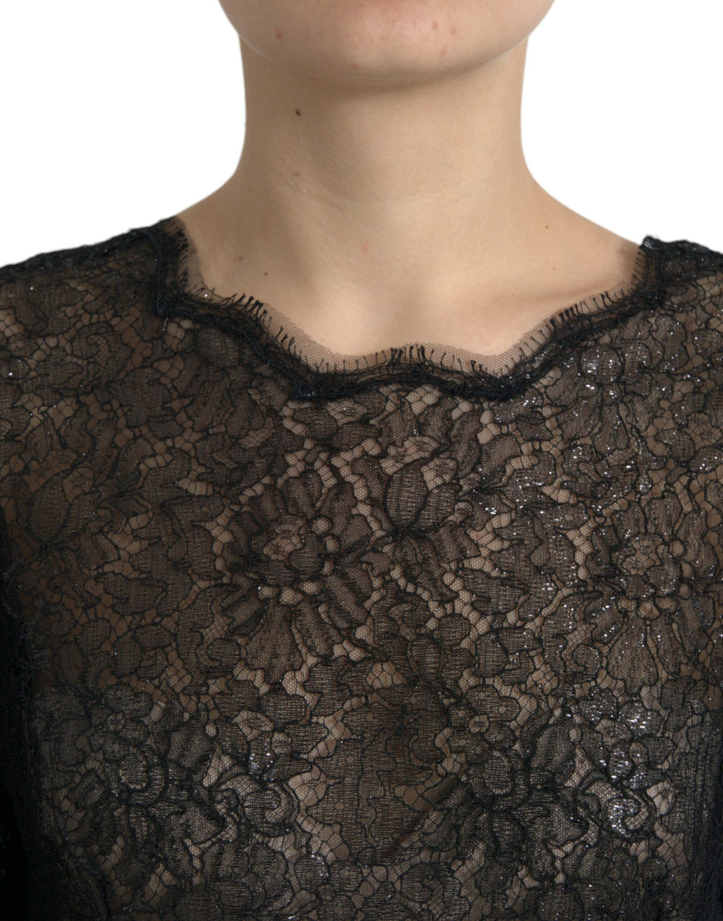 Robe midi en dentelle florale noire Dolce & Gabbana, silhouette évasée, robe transparente à la taille, élégante et sophistiquée.
