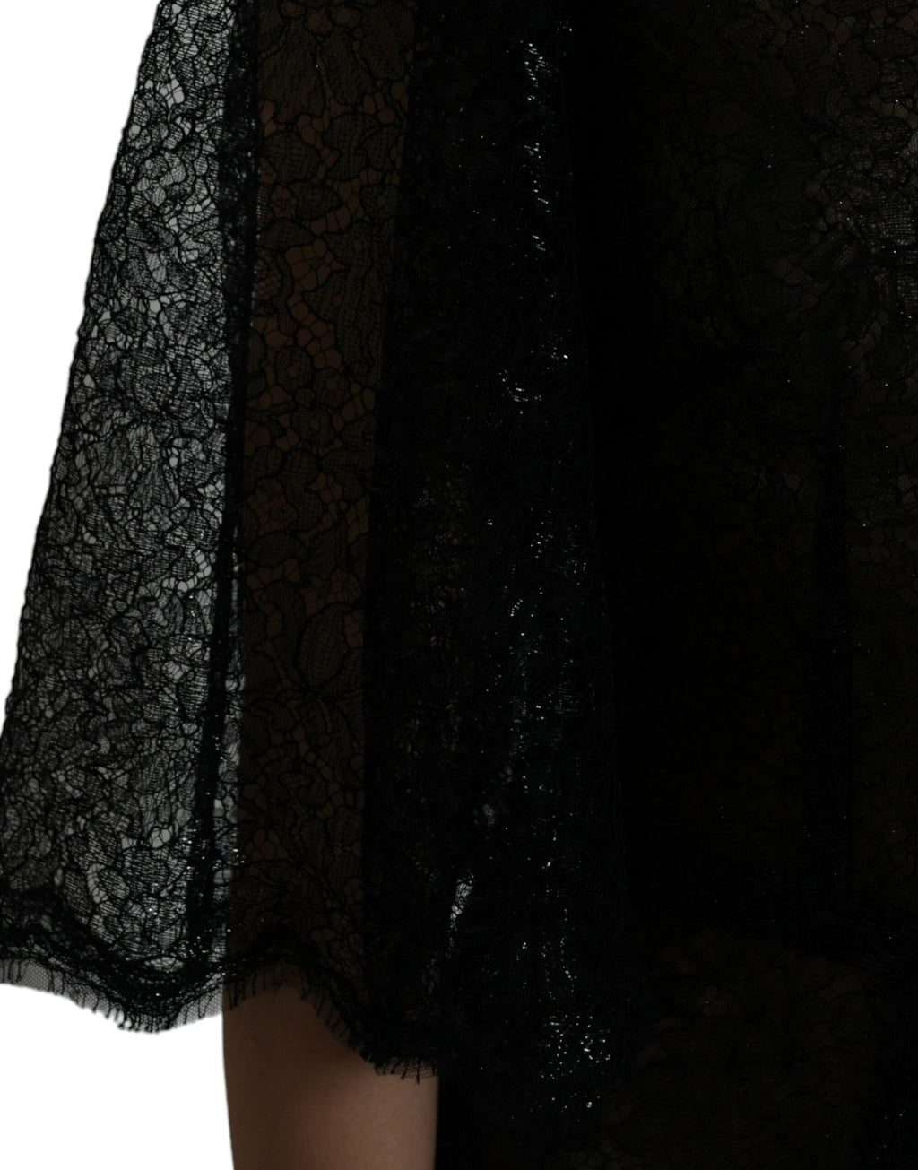Robe midi noire en dentelle florale transparente de Dolce & Gabbana, coupe en ligne A élégante et sophistiquée.