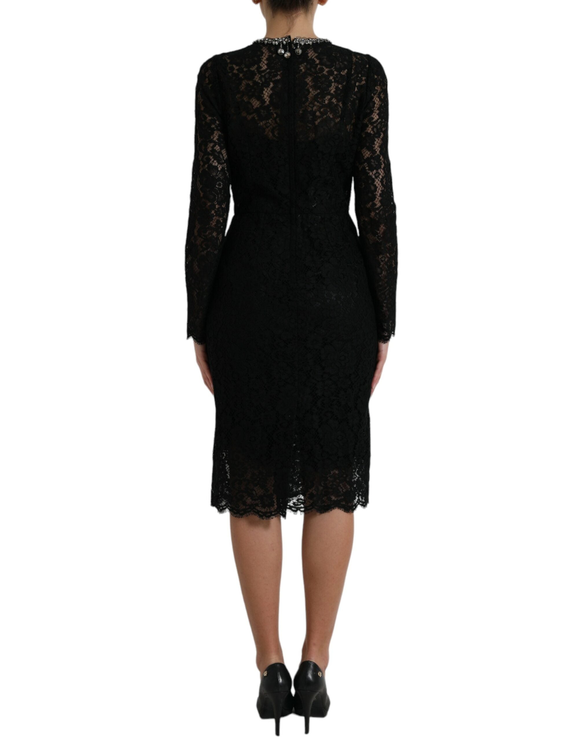 Robe noire en dentelle avec cristaux de Dolce & Gabbana, robe moulante élégante avec détails brodés et embellissements scintillants.