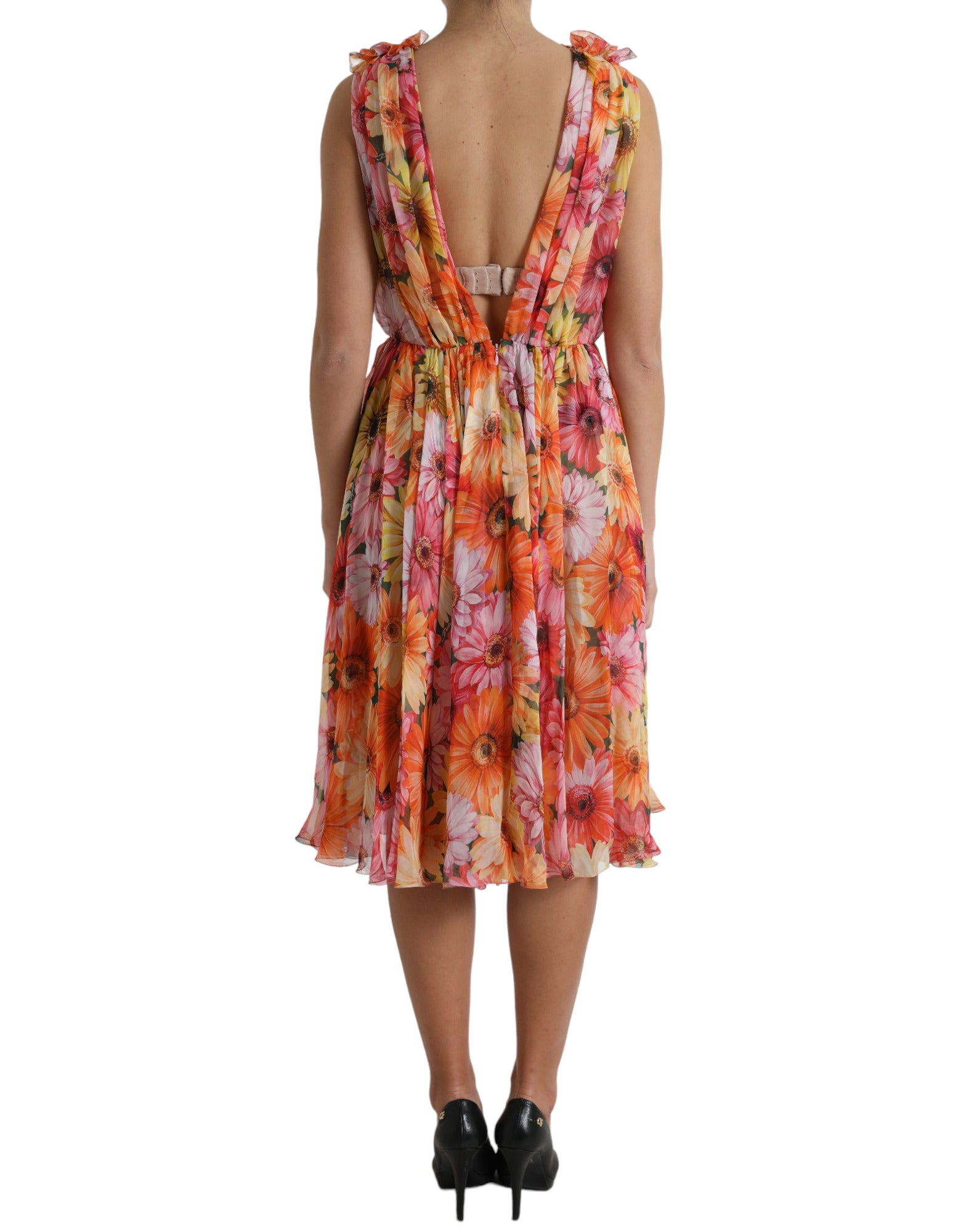Robe midi en soie de Dolce & Gabbana avec motif multicolore de tournesols, style élégant et sophistiqué.