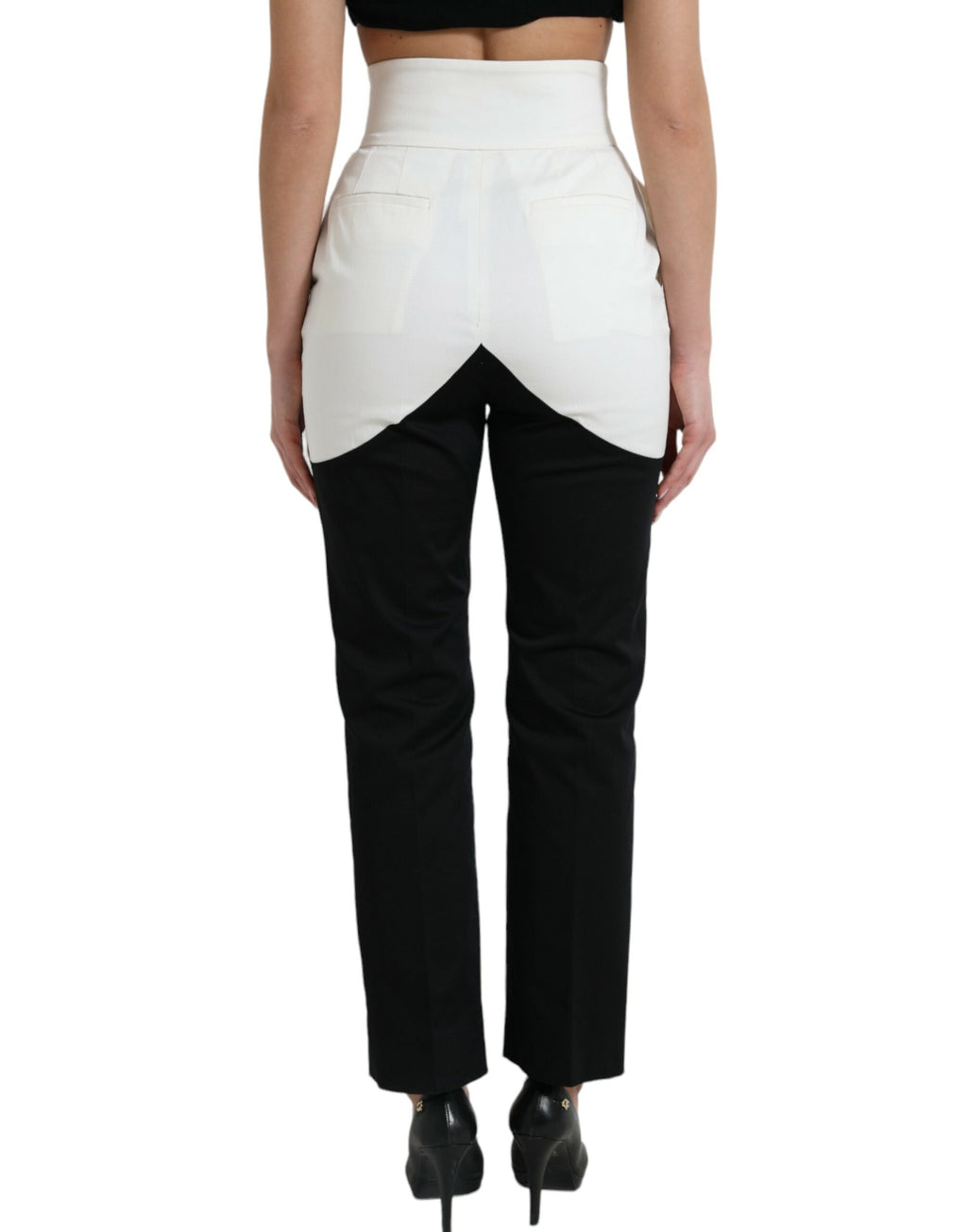 Pantalons tapered en coton noir et blanc de Dolce & Gabbana avec découpe à la taille, ajustés et élégants.